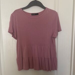 Women's Pink peplum blouse.